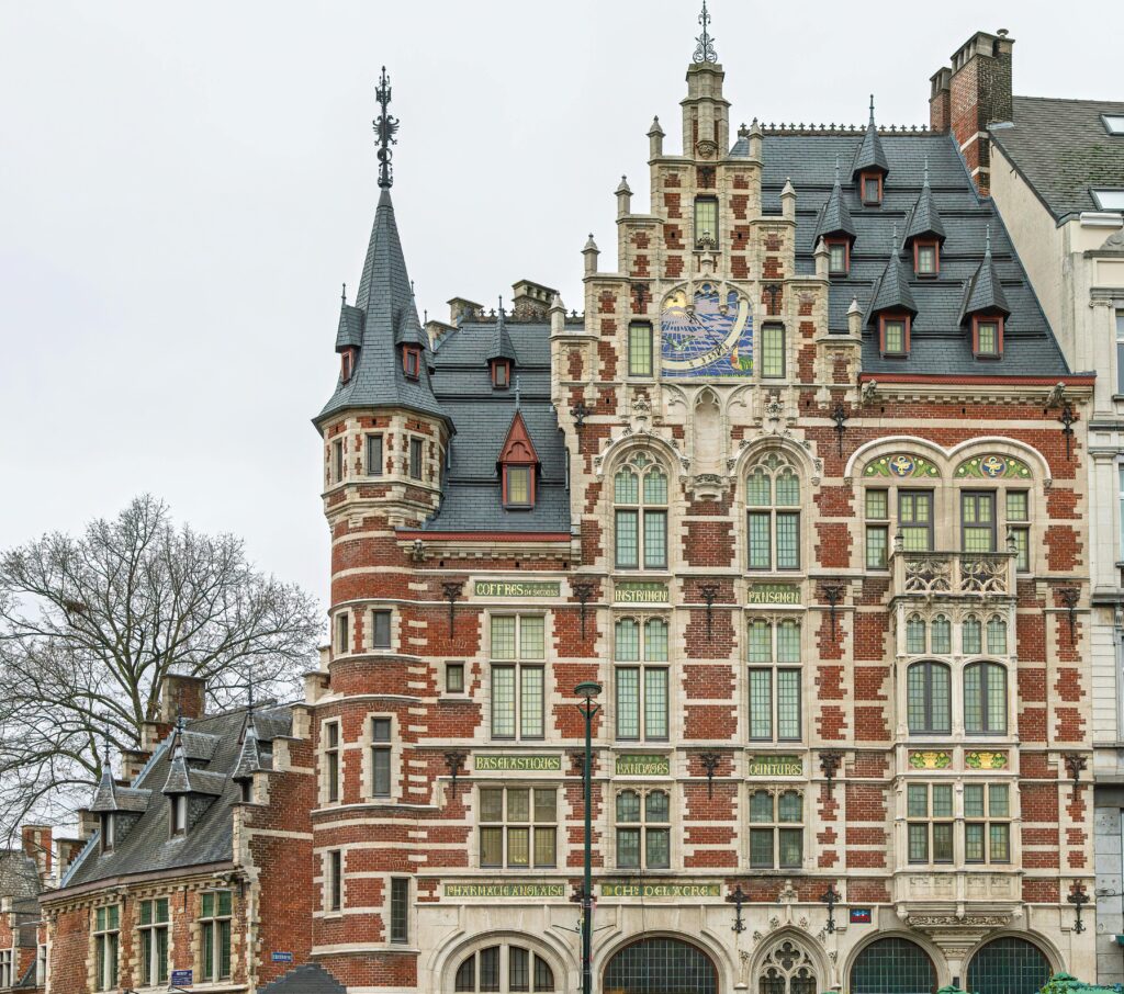 Elaborate Gothic Revival building facade in Brussels, showcasing intricate architectural details.
